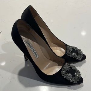 Manolo Blahnik, repair and a little scuff on the one heel.